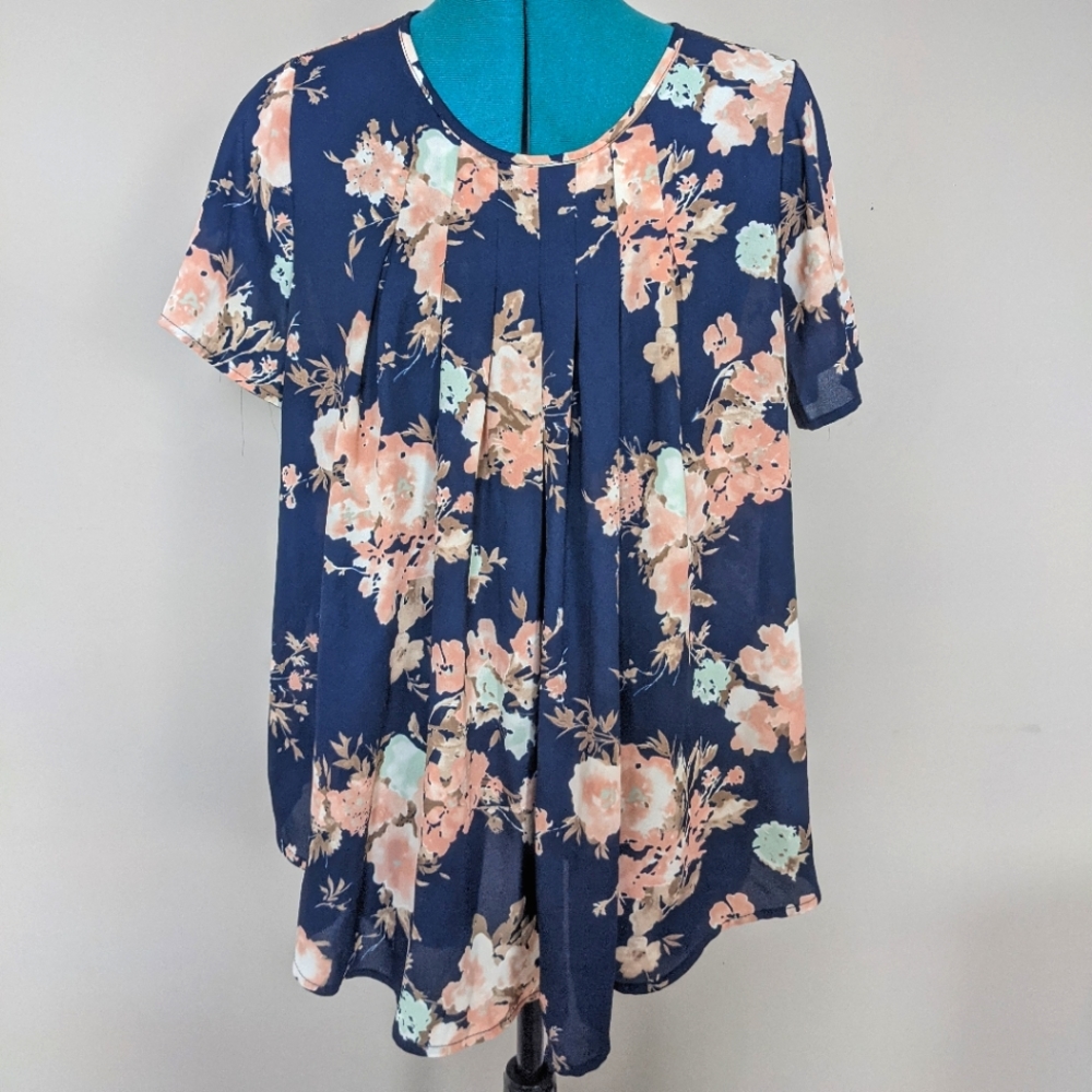 Sienna Sky - Navy Floral Blouse with Pleated Front. Lose-fitting, flowy blouse